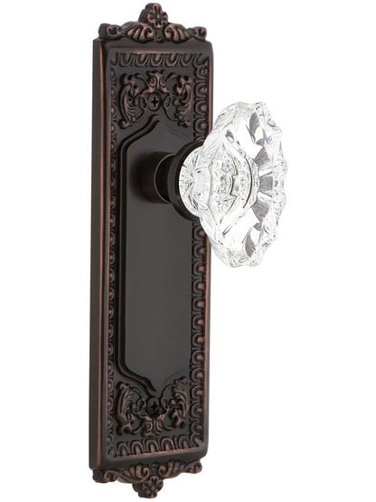 Egg and Dart Design Door Set with Chateau Crystal Glass Knobs in Timeless Bronze.